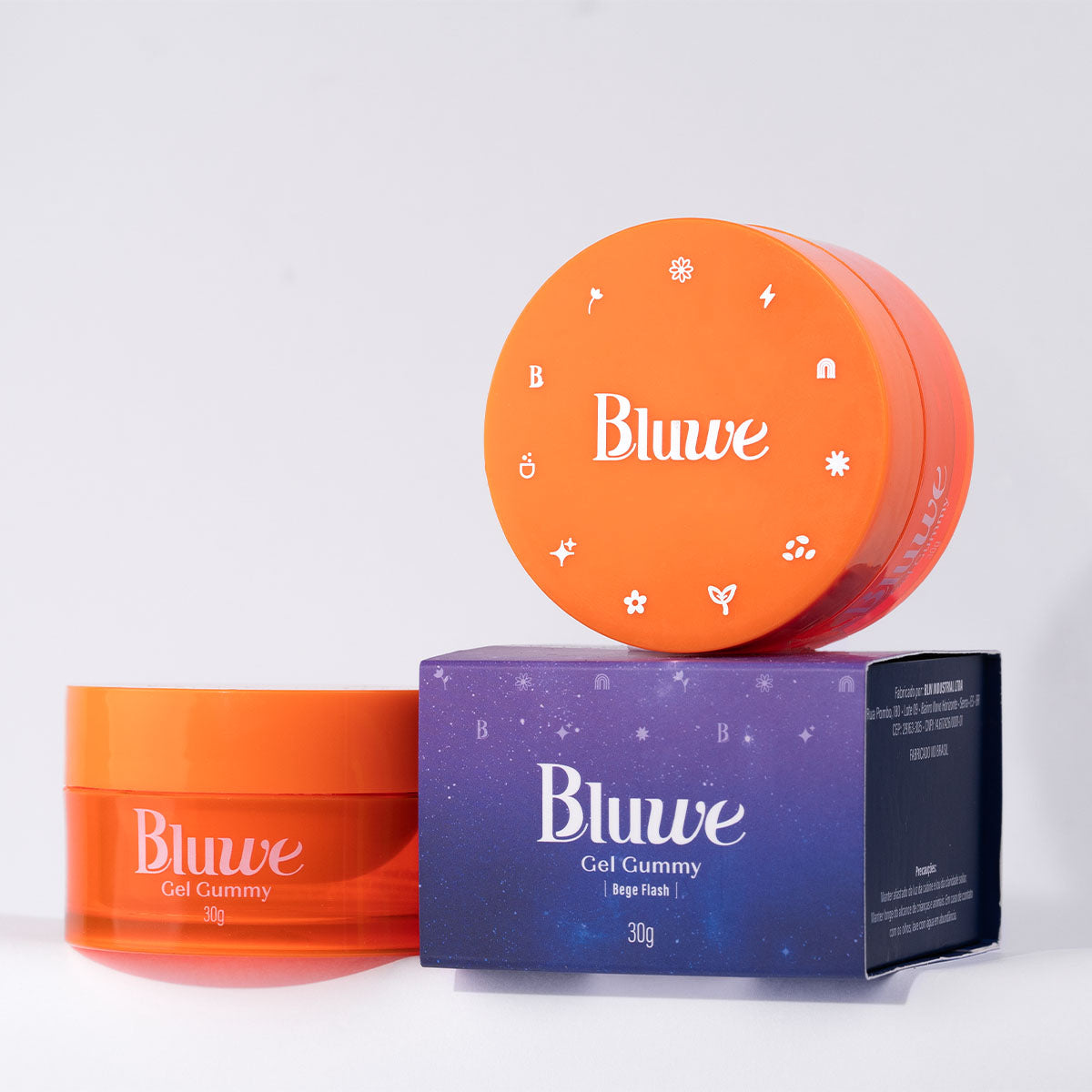 dois potes e uma caixa do produto gel gummy