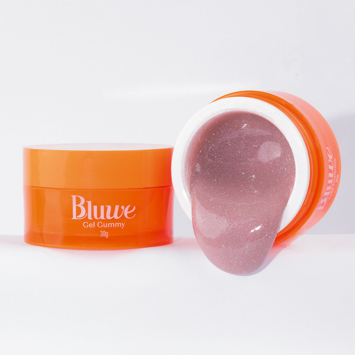 gel gummy bege flash, de cor rosa e com glitters que refletem ao flash